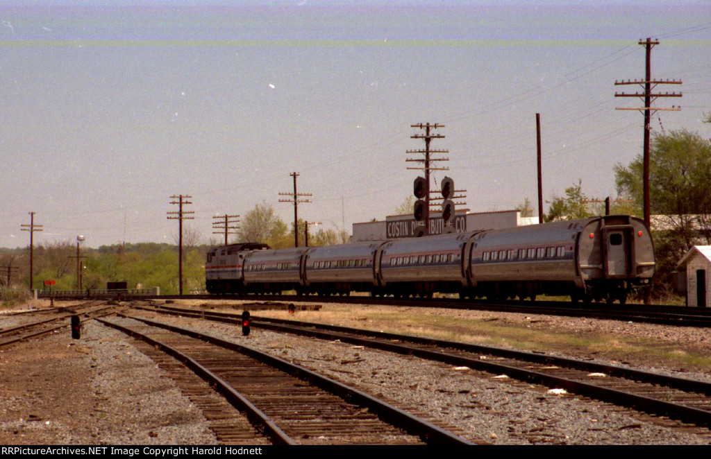 AMTK 268 leads a northbound passenger train past the signals